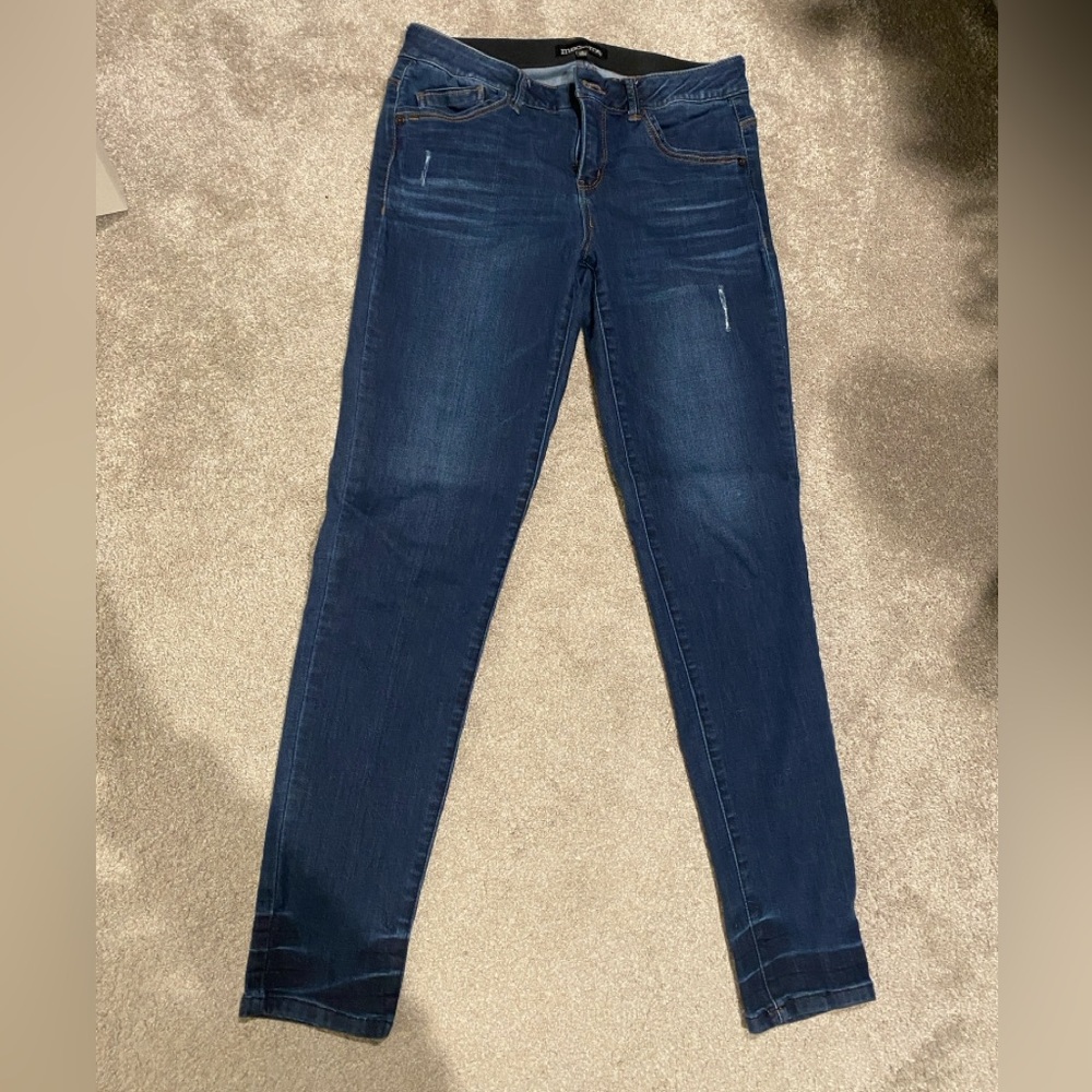 Blue Skinny Jeans with Distressed Details